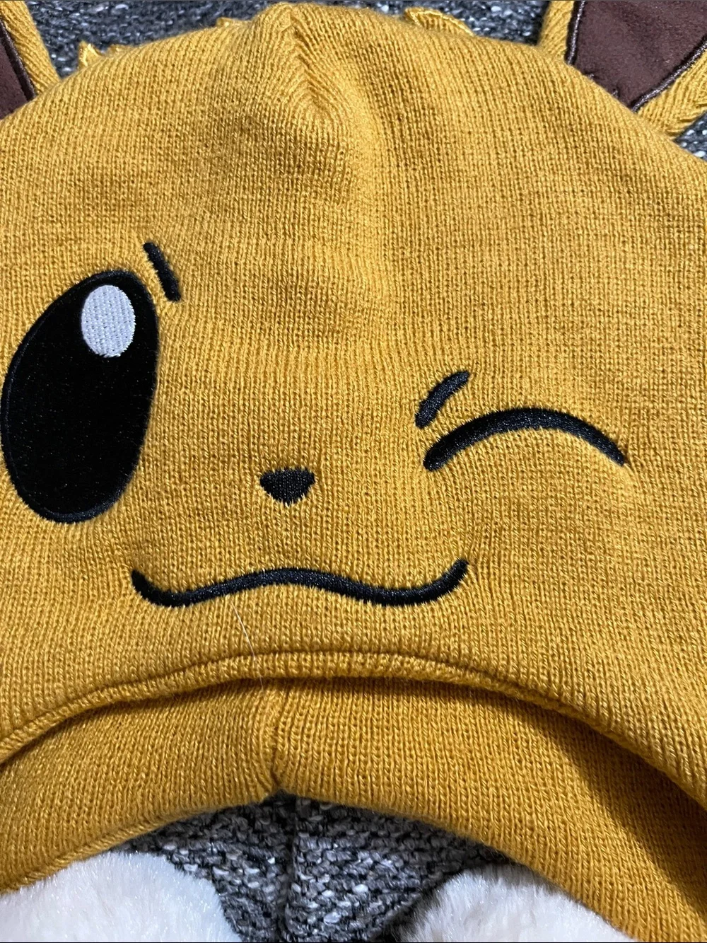 Pokemon Winking Eevee with Ears Beanie Hat with Pom-Pom Tassels